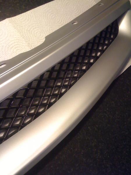 project rattlecan number 1 - mask up and paint type r rep grill. Total cost inc tins of paint, masking tape etc 42pounds!