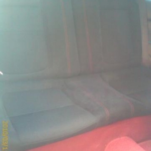 seat with red stiches