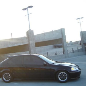 Early on pics of the car. It came tinted. First set of rims after the EM1 Si rims: Mugen CF-48s.