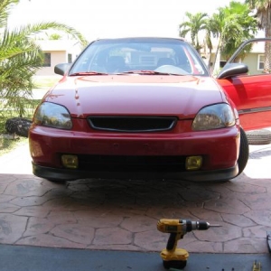 jdm black housing headlight w/6k hi/low hids, front grill, yellow jdm style fog lights, spoon style front lip