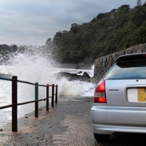 nice pic with the waves charshing against the wall