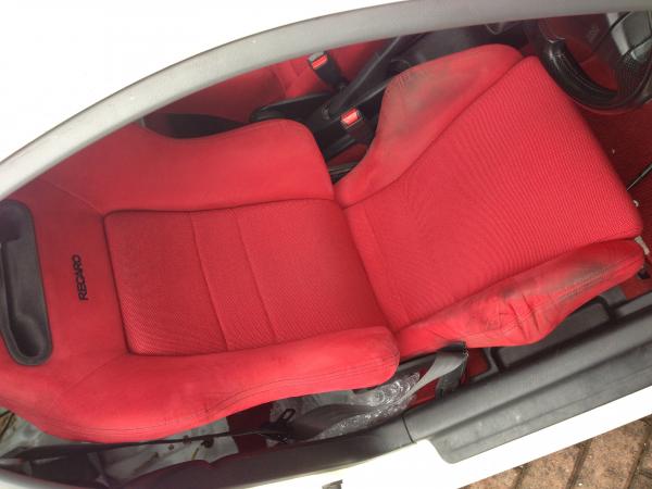 Drivers seat before a steam clean and replacement seat bolsters/fabric